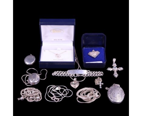 A group of vintage white metal pendants, lockets, chains, a necklace and an identity bracelet, including a Babycham fawn pend