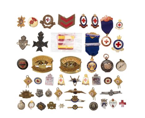 A group of The British Red Cross, WVS, RAF, Army Catering Corps. and similar medals, badges and insignia, etc