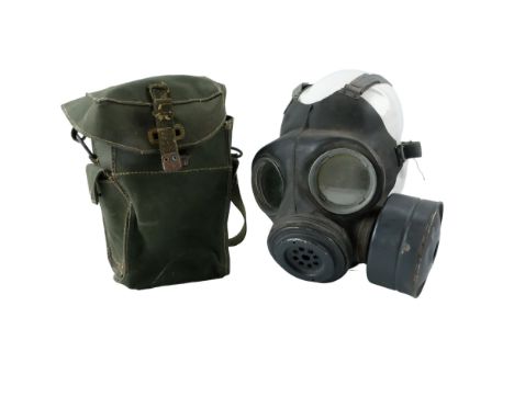 A Second World War British Army Lightweight Respirator in jungle green case