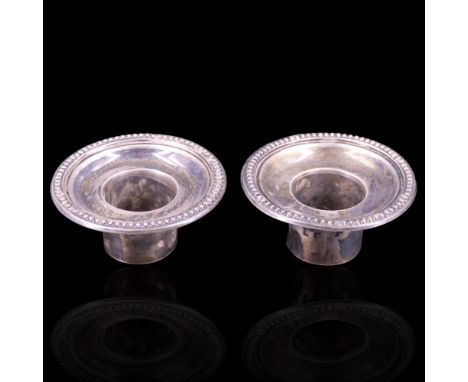 A pair of late Victorian silver candlestick bobeches, William Hutton, sockets 23 mm diameter
