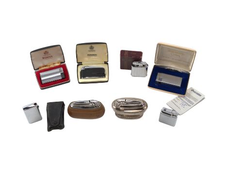 A group of vintage cigarette lighters including a cased Ronson Varaflame and Colibri Monogas, together with two Ronson table 
