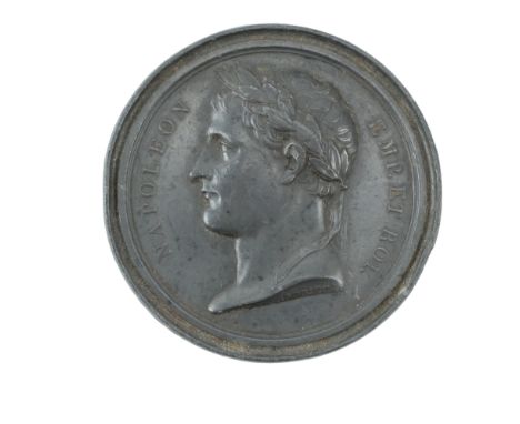 A Napoleonic relief profile portrait lead plaque or medalette after Andriea, 7 cm