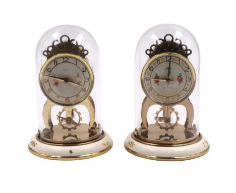 A pair of vintage August Schatz &amp; Sohne enamelled and gilt 8-day torsion clocks, circa 1960s, former 15 cm 