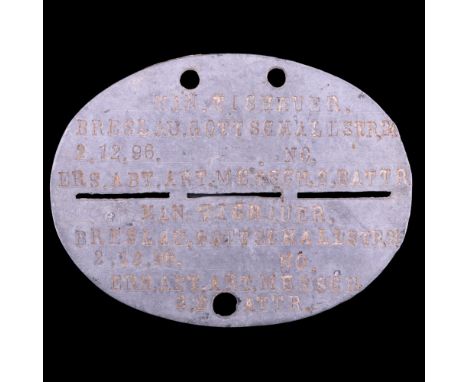 An Imperial German Army identity disc of an ersatz artillery battalion soldier
