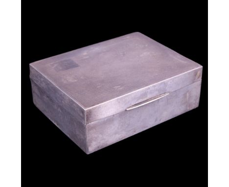 A 1930s silver table cigarette box, the hinged lid engine turn decorated and bearing engraved initials "MC", Birmingham, 1936