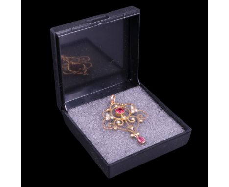 An early 20th Century almandine and seed pearl openwork 9 ct gold pendant, 43 x 30 cm excluding bale, 2.8 g 