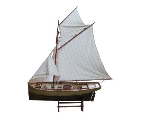 A scale model boat, 71 cm x 23 cm x 93 cm