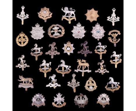 A group of British Army cap badges