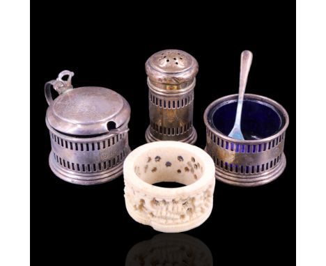 A 1930s silver condiment set comprising a mustard pot, salt cellar and pepperette together with a hand-carved bone napkin rin