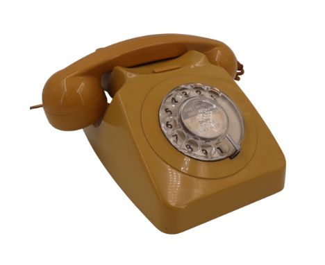 A 1960s/1970s GPO 746 mustard Bakelite rotary dial telephone, having a Carlisle dial number card