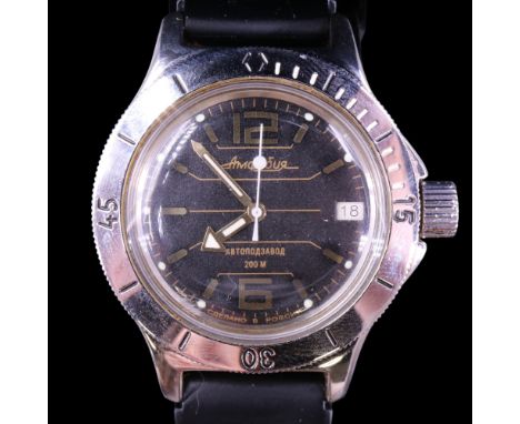 A Russian Vostock Amphibian diver's wristwatch, having a crown-wound movement, black and gilt face, luminous arrow hands and 