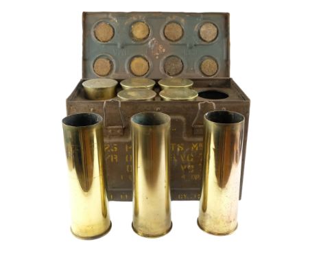 A 1940 British Army 25-pounder artillery shell case ammunition box and brass shell cases