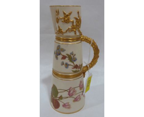 A Royal Worcester conical jug, no. 1047, painted in coloured enamels with flowers and enriched with gilding. 8' high
