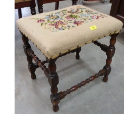 A turned oak stool with tapestry seat. 18' wide