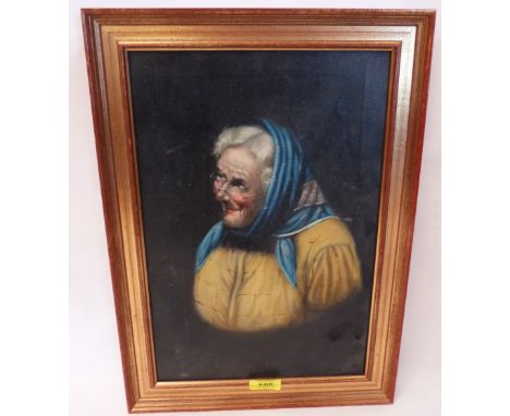 19TH CENTURY SCHOOL Portrait of an elderly lady wearing a blue headscarf. Indistinctly signed. Oil on canvas. 15' x 10'