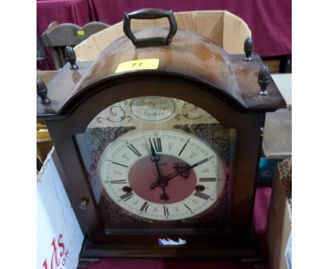 A bracket clock of recent manufacture, the three train movement striking and chiming on 8 tubular gongs. 12' high