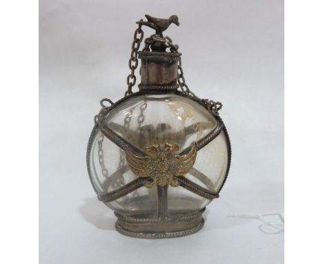 An East European white metal mounted glass pilgrim flask, applied to both faces with a gilt double headed Imperial eagle