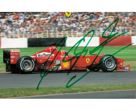 Michael Schumacher signed 6x4 inch colour photo pictured driving for Ferrari in Formula One. Good condition. All autographs c