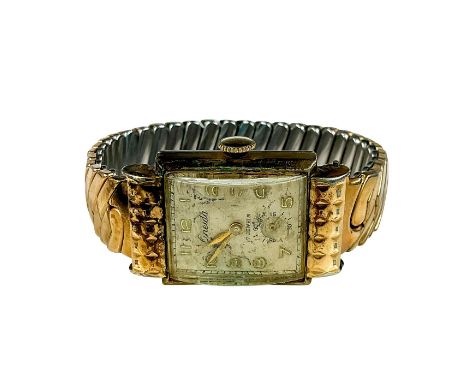Finesse 10k yellow and white gold accordion band stamped on the inside. Dimensions: 2" dia. unstretchedCondition: Age related