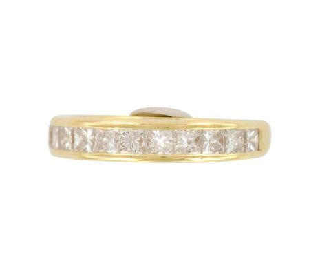 Gorgeous Ladies Ring with 11 square shape Princess cut diamonds that are F-G color, VS2 clarity. Total stones weight is 1.10c
