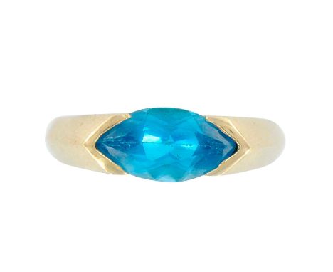Lovely mid century geometric design ring with a Marquise cut blue topaz. Weight 3.8 grams. Size 7.5. Marked 14K. Condition: G
