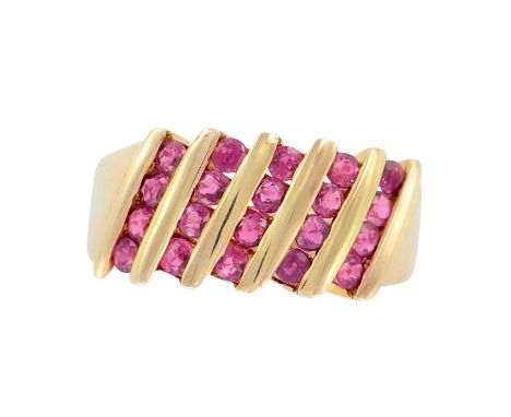 Attractive ring with 20 round cut pink stones between gold bands in a diagonal setting. 10K and THL stamped inside. Size 7.25