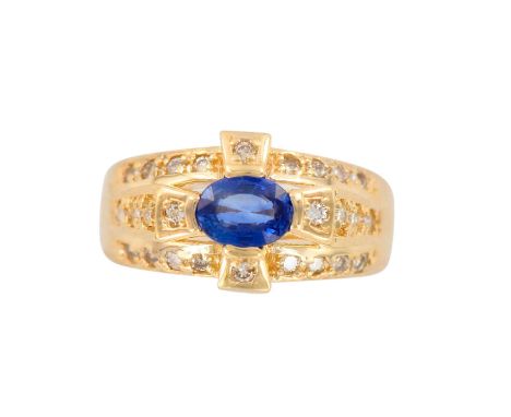 An eye catching ladies ring with a Celtic cross design. Oval sapphire measures 7mm x 5mm and it's surrounded by 28pc round br