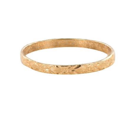 A 10KP childâ€™s ring with engraved starburst design on the band. Manufacture hallmark and 10KP impressed stamp on the band. 