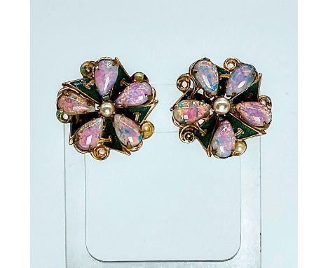 Opal petals around a pearl center on green background with gold tone setting. Dimensions: 1" dia.Condition: Good, minor age r