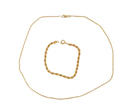 14K chain with yellow and white gold intertwined. Italy embossed on the necklace link before lobster claw clasp, 18"L. Bracel