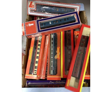 Approximately nineteen OO gauge coaches from Hornby, Mainline, Lima etc. boxed.