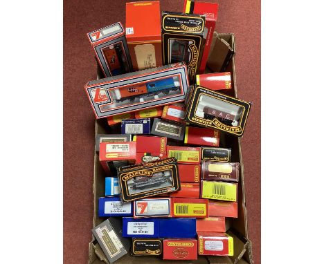 Approximately forty OO gauge rolling stock from Hornby, Mainline, Lima etc. boxed.
