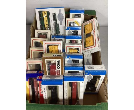 Approximately twenty-three HO gauge American Outline rolling stock from Bachmann, model power boxed, etc. One Box