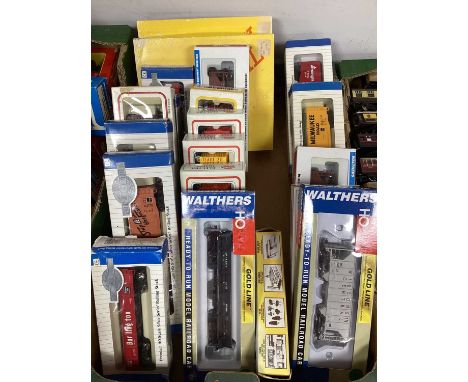 Approximately twenty HO gauge American outline rolling stock from Walthers, Bachmann and Model Power etc. boxed. One box