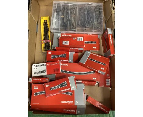 A collection of Fleischmann N gauge track including points, straights, cross overs, curves etc. mostly boxed.
