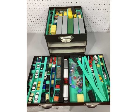 A large quantity of HO model vehicles and accessories contained in three drawer box including cars, truck and trailers, playw