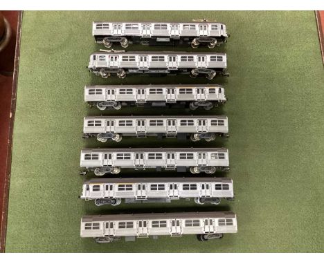 A Jouef HO Gauge SNCF Powered Railcar and Dummy Car (Pantographs to roof) together with Five Coaches, all with Silver Livery,