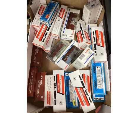 Approximately twenty-nine HO scale outline continental rolling stock from Marklin and Klein, boxed.