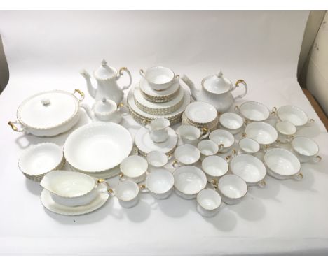 An extensive white glazed dinner and tea service by Royal Albert, 'Val D'Or'.