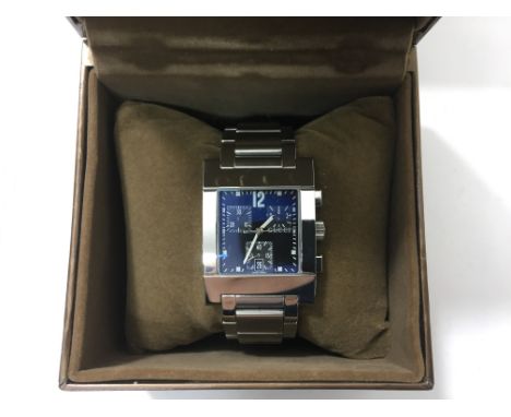 A gents boxed Gucci chronograph wrist watch with date aperture and 3 subsidiary dials.