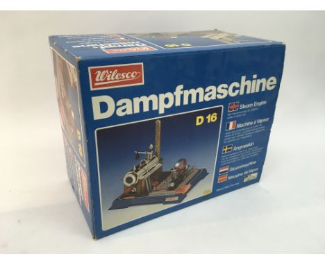 A boxed Wilesco D16 static steam engine.