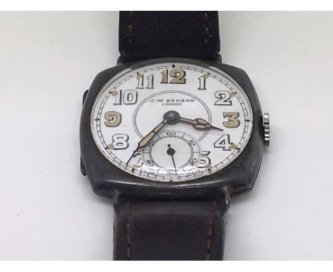 A Vintage silver cased Gents J W Benson Wrist watch with illuminated quarter battons and with second subsidiary dial. Working
