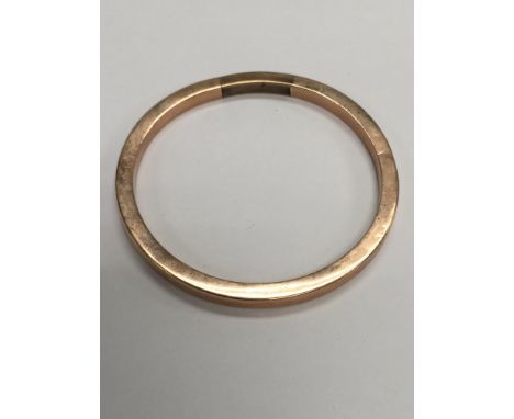 A Victorian 9ct rose gold bangle