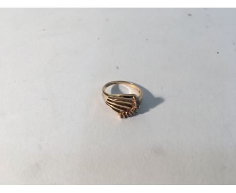 A 14ct gold modern design ring set with diamonds. Weight approx 4.6g Size approx N