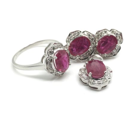 A ladies 9ct white gold (stamped 385), diamond and ruby jewellery set to comprise of a ring (size O/P) with a central ruby su