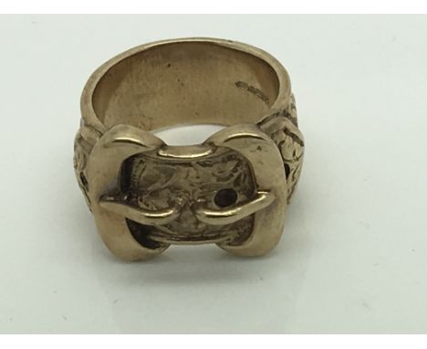 A Gents 9ct gold buckle ring weight 24g.