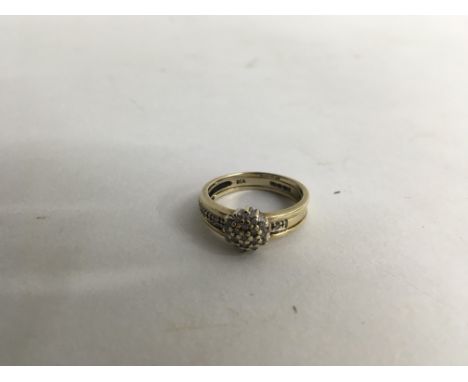 A two sectional 9ct gold and diamond ring. Size approx O Weight approx 4g