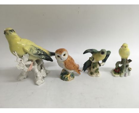 A collection of ceramic birds.