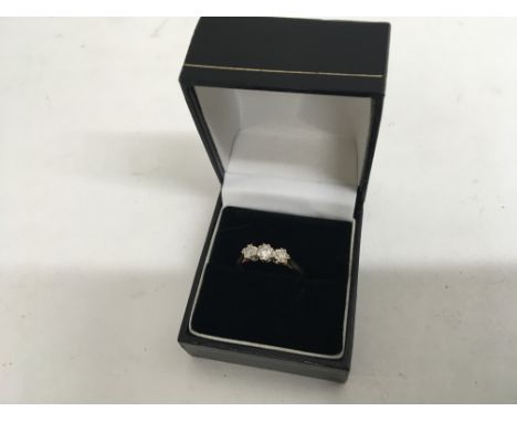 A 9ct gold three stone diamond ring. Weight approx 4g Size approx O/P