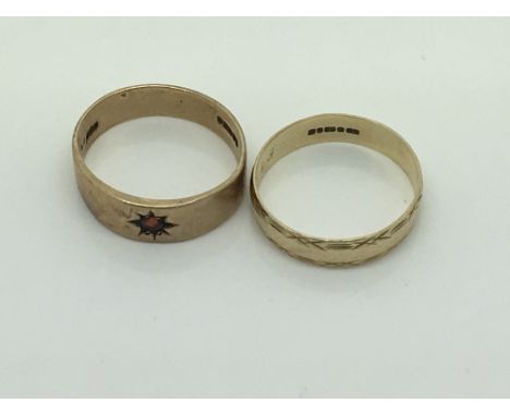 Two 9ct gold rings one set with a ruby. 6g approx.